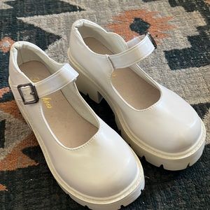 Cream colored Mary Janes